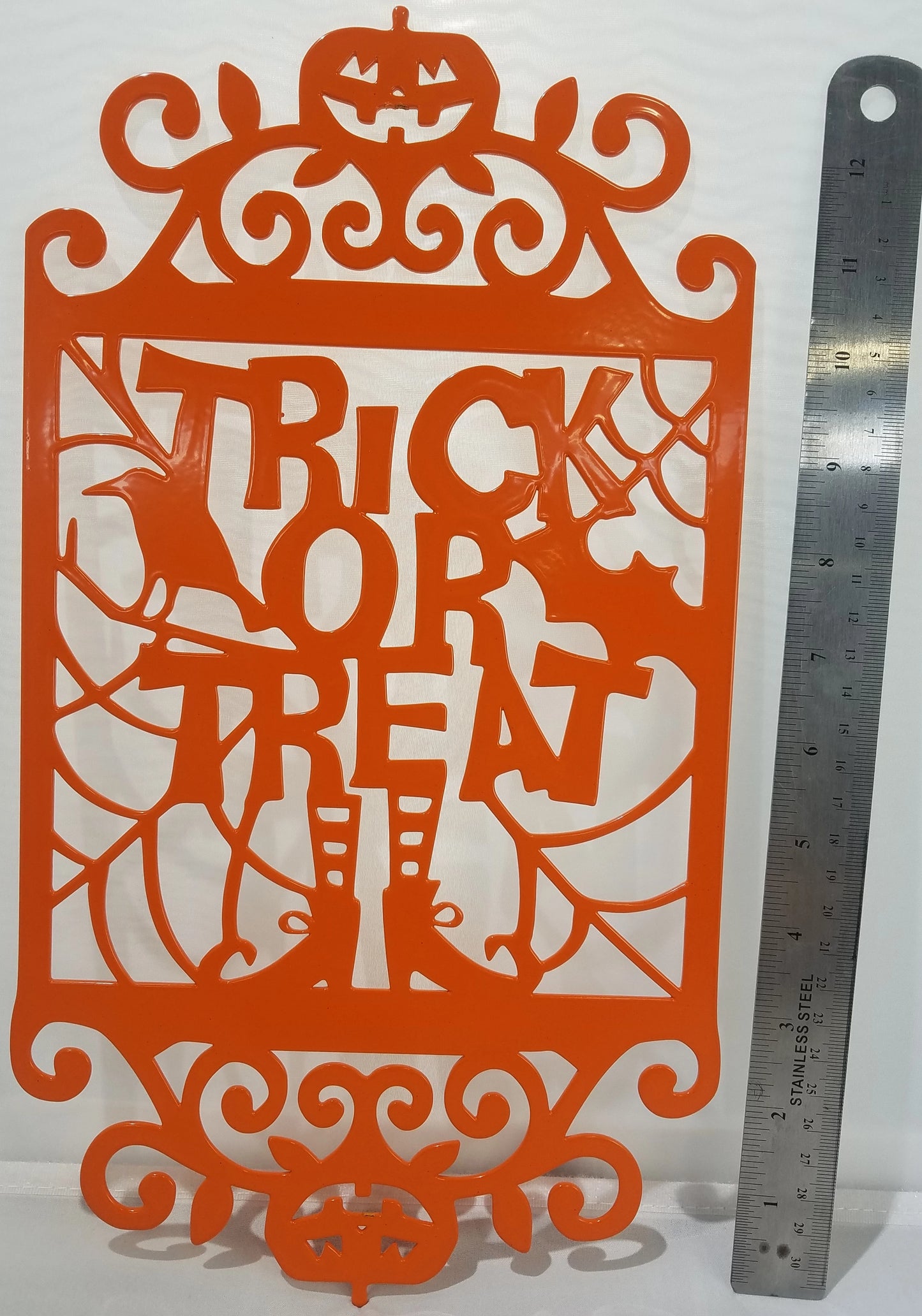 "TRICK OR TREAT" Text With Witches Feet in Rectangle